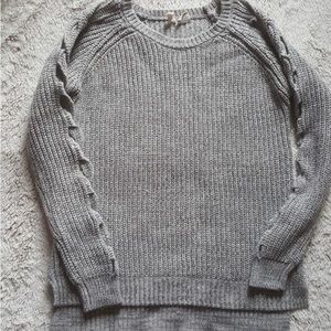 Grey crew neck sweater w/ braided patterned sleeve